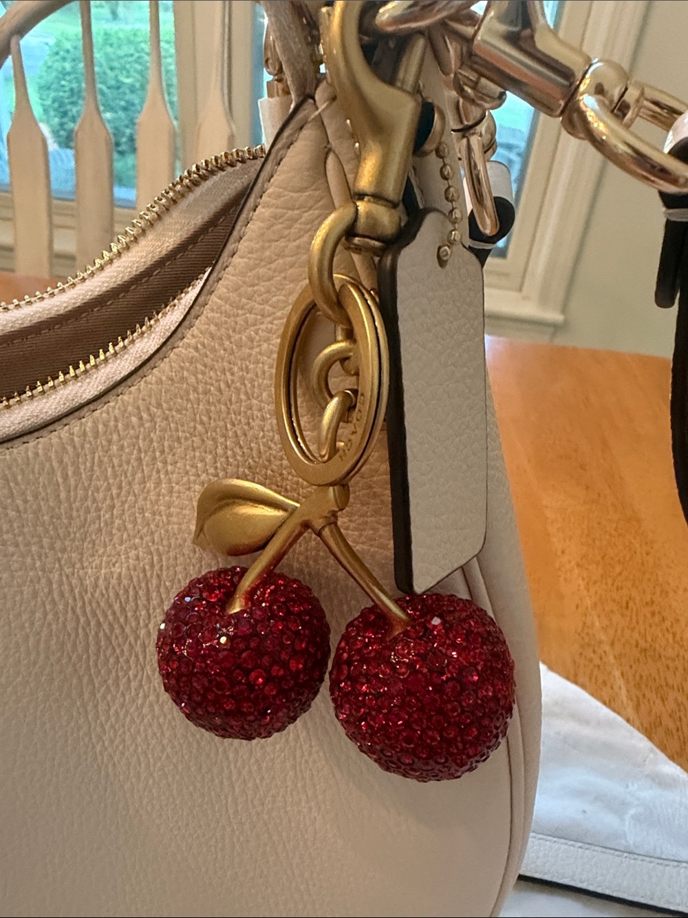 Coach Chalk Pebble Leather Shoulder Bag with Red Cherry Charm - Picture 2 of 11
